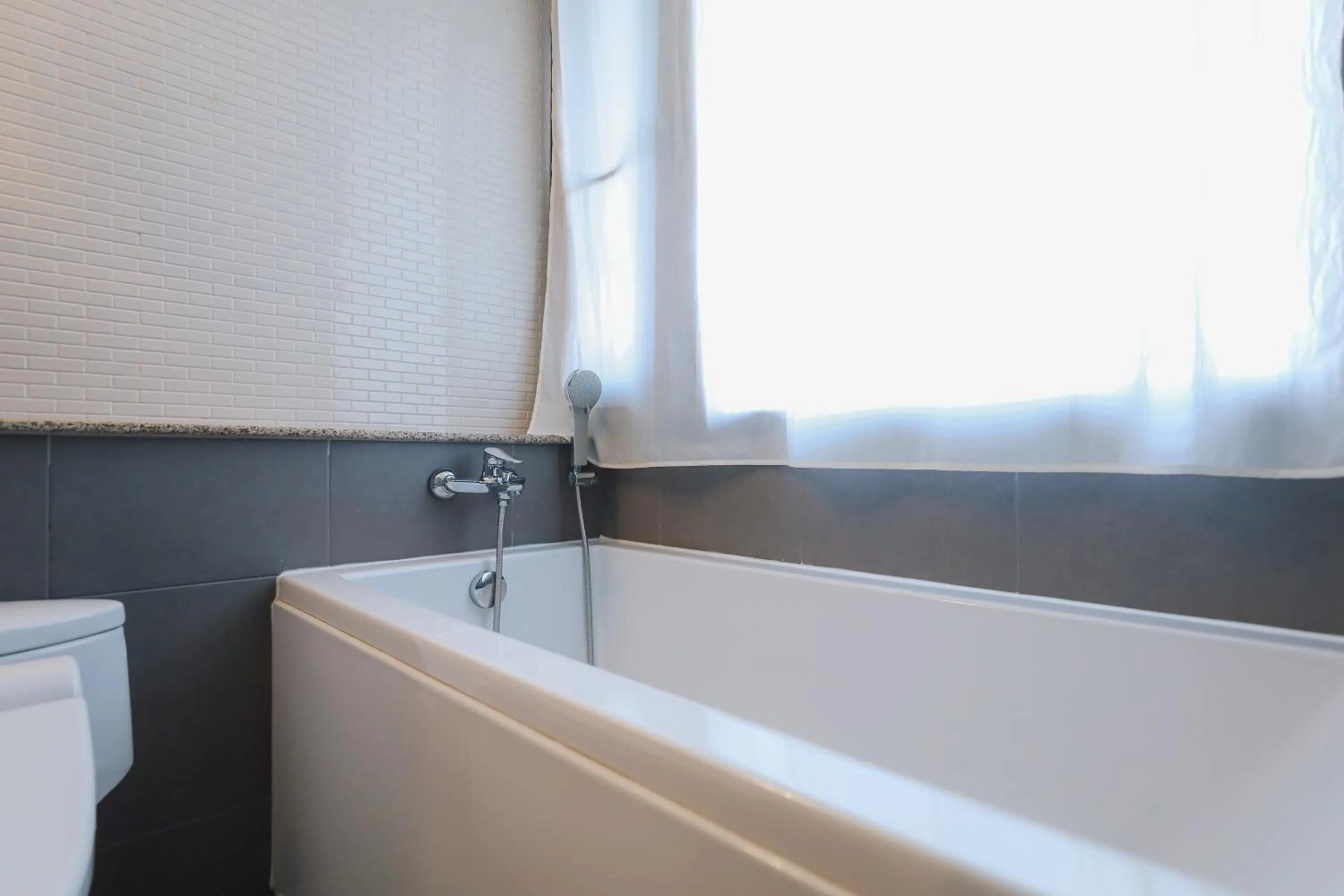 Bathroom in Balcony Courtyard Sriracha Hotel & Serviced Apartments