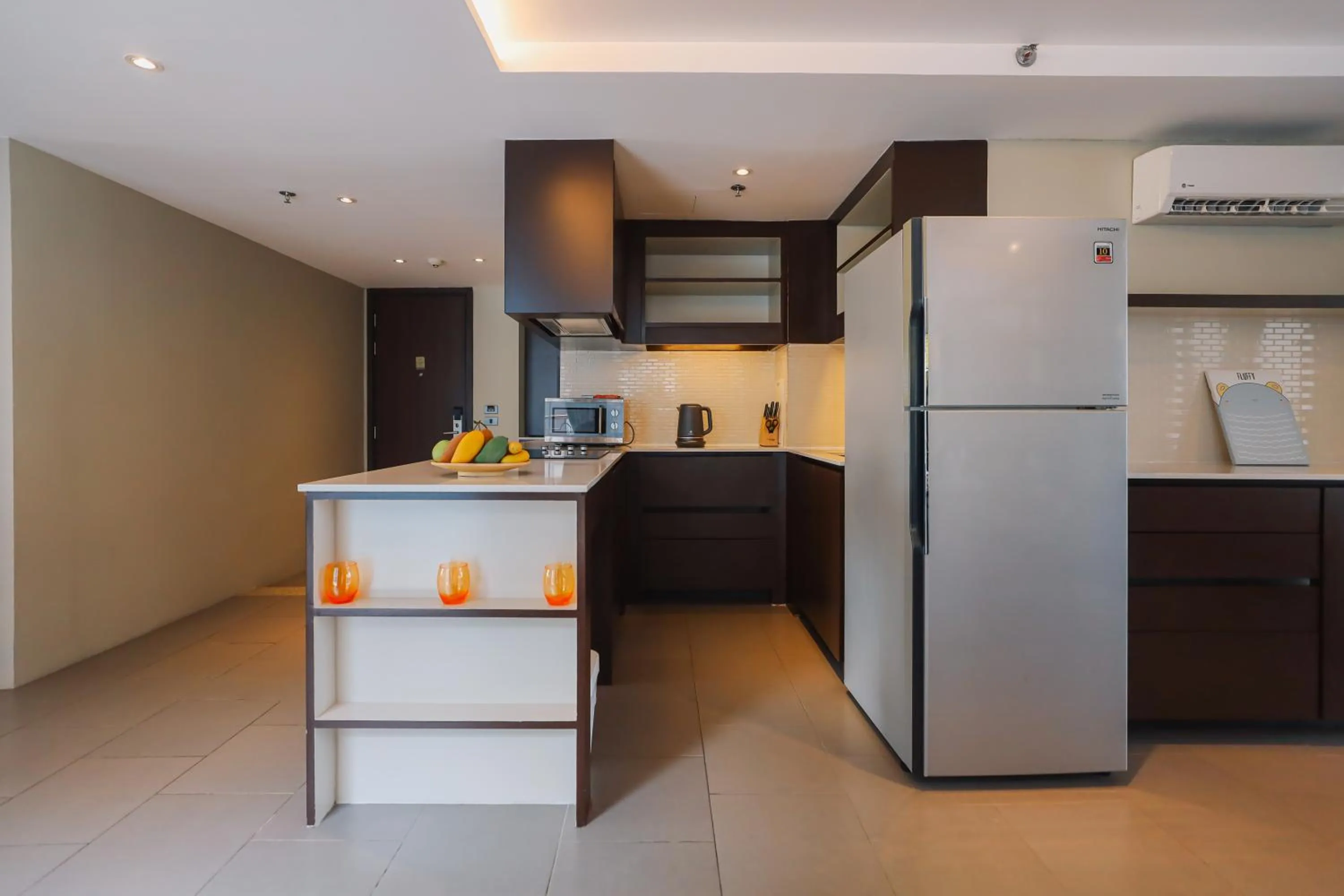 Kitchen or kitchenette in Balcony Courtyard Sriracha Hotel & Serviced Apartments