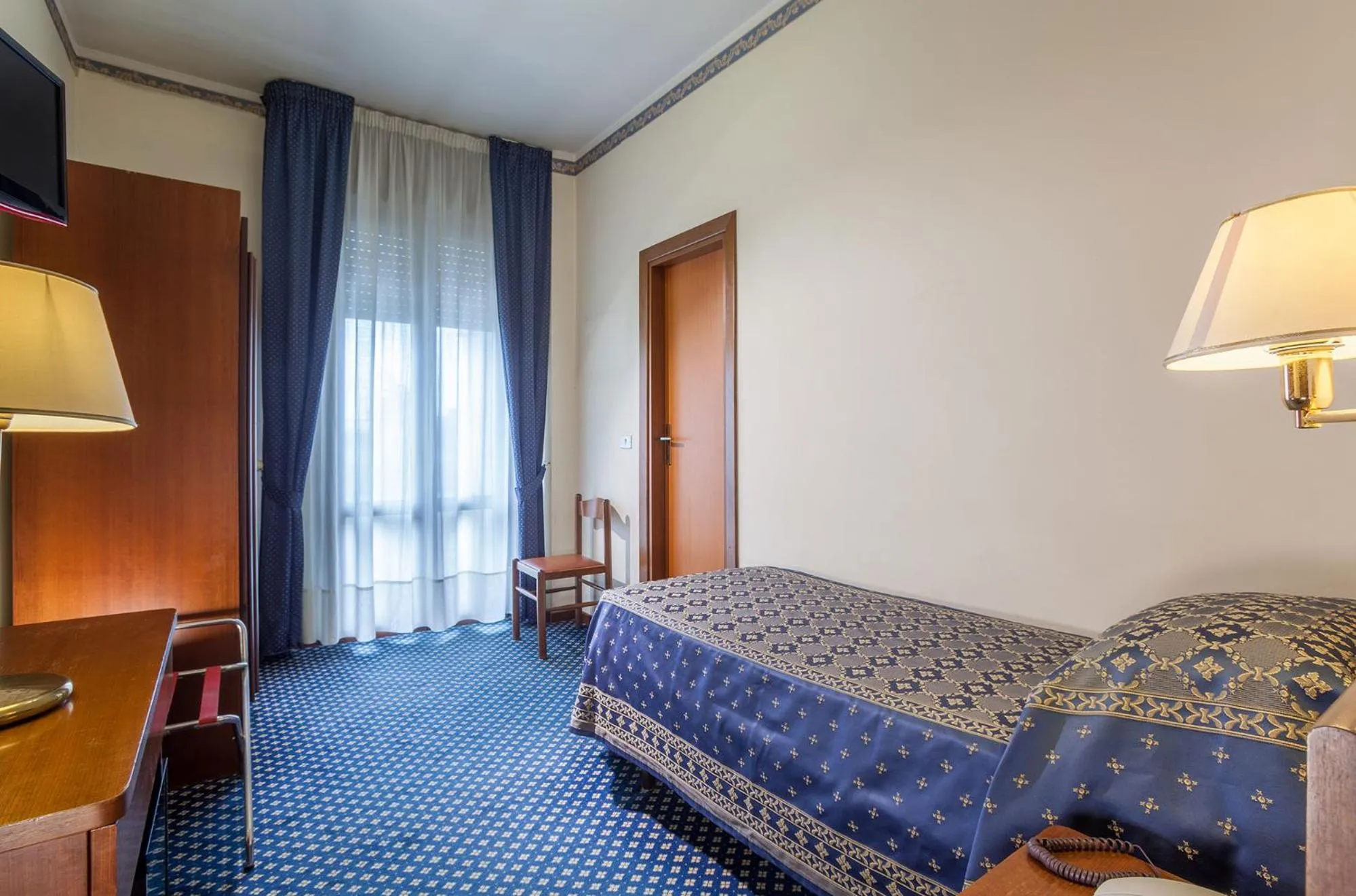 Bed in Hotel Firenze