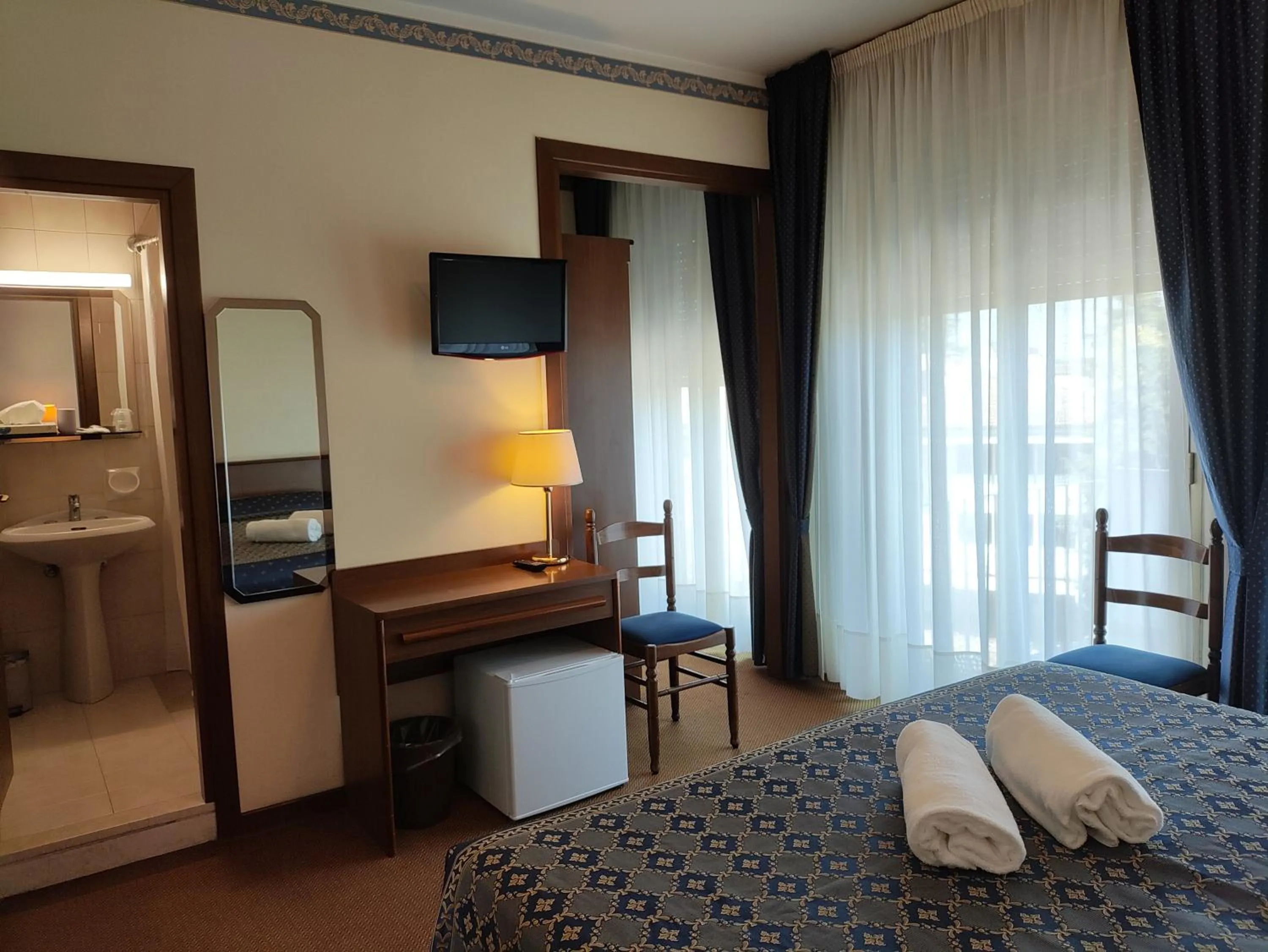 Bed in Hotel Firenze