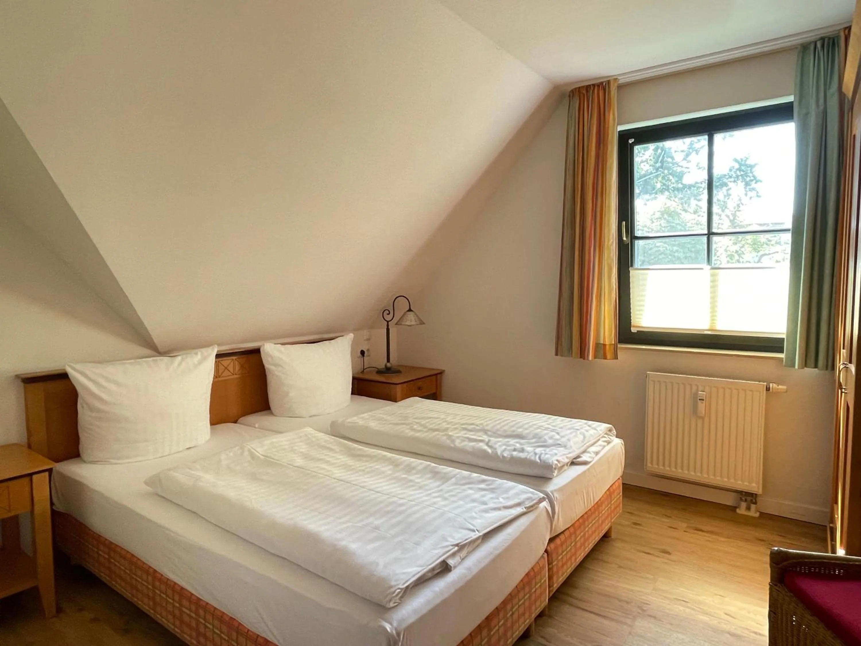 Bedroom, Bed in Moby Dick Hotel & Ferienwohnungen