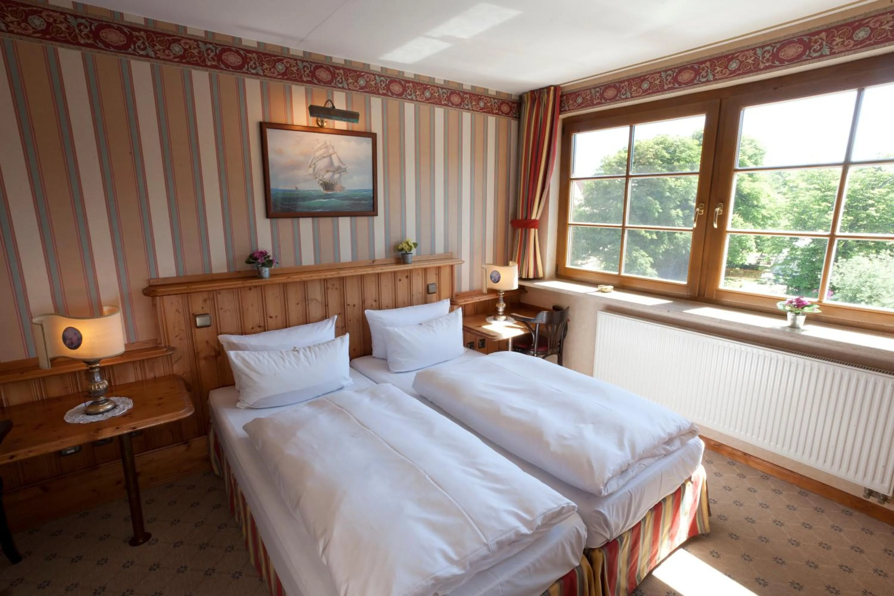 Bed in Moby Dick Hotel & Ferienwohnungen