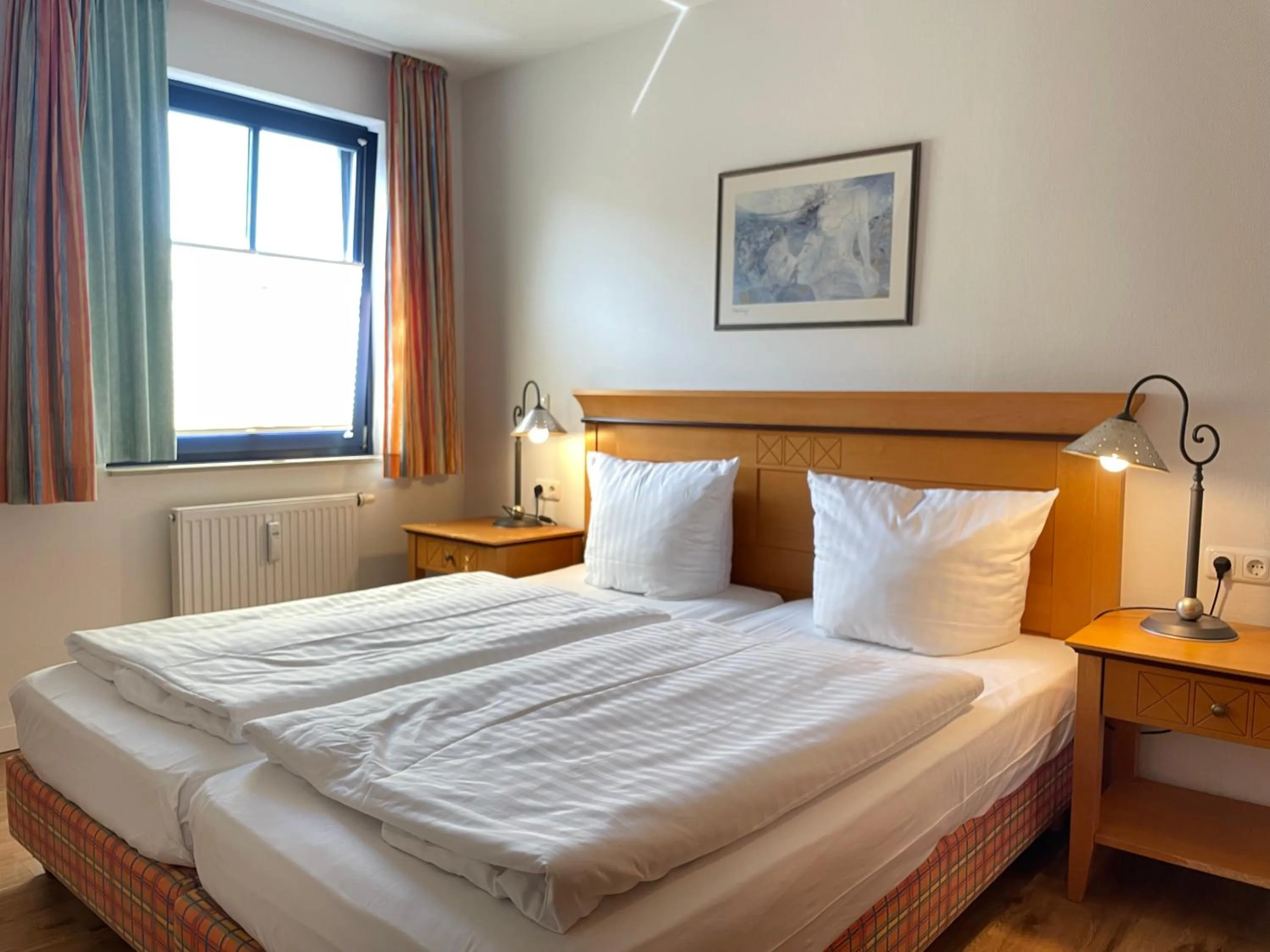 Bedroom, Bed in Moby Dick Hotel & Ferienwohnungen