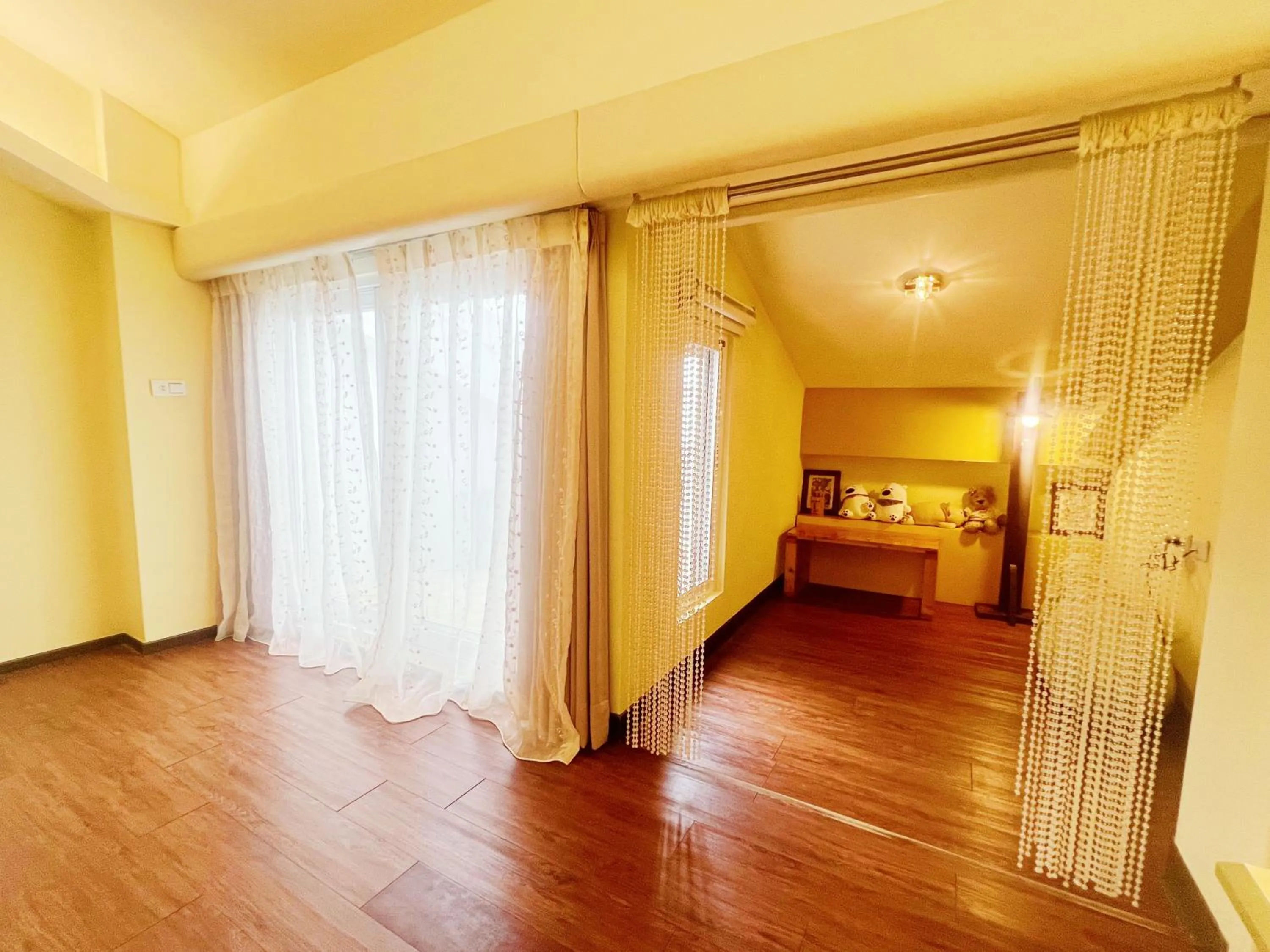 Living room, Bed in 墾丁茉莉民宿