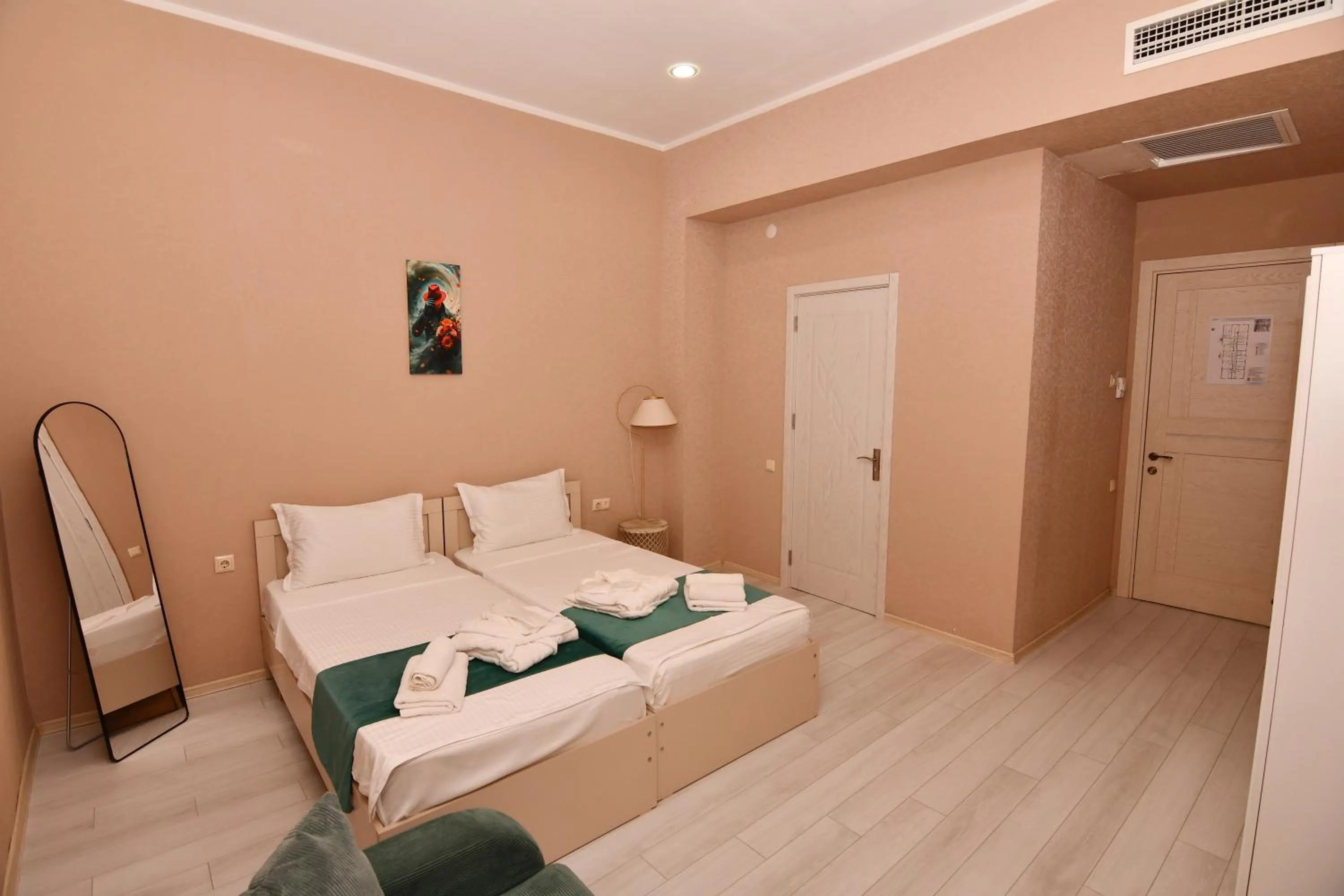 Bed in Astoria Hotel