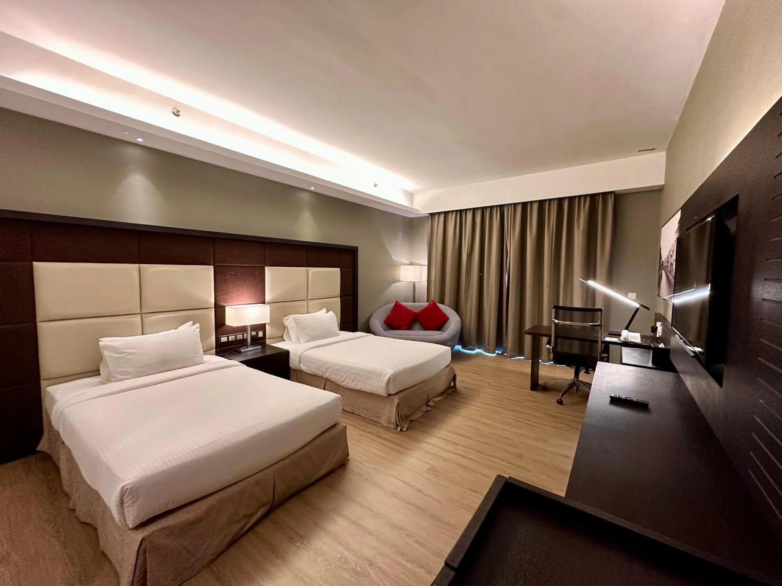 Communal lounge/ TV room, Bed in Swiss-Garden Hotel Melaka