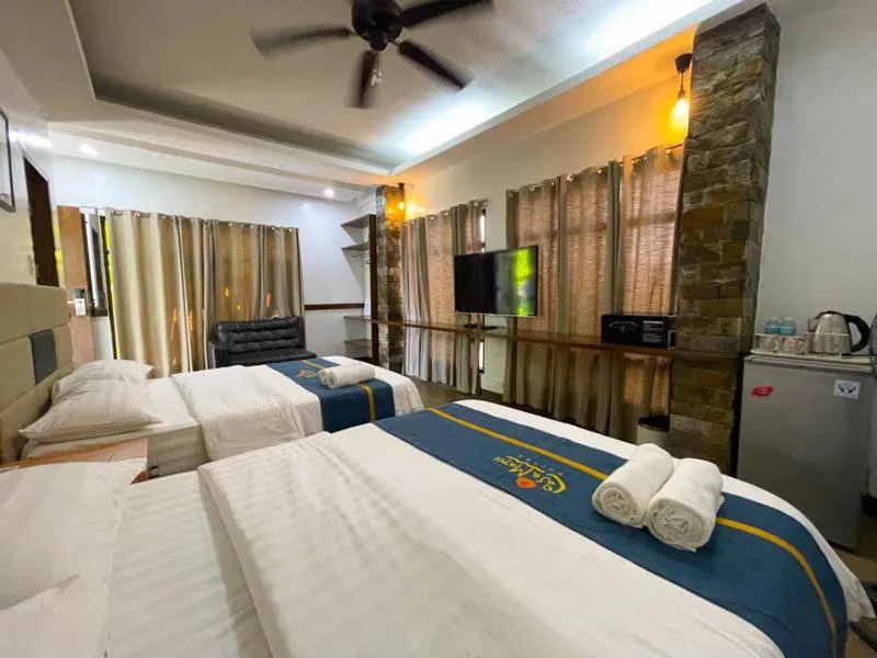 Photo of the whole room, Bed in Casa Marco Suites Puerto Galera powered by Cocotel