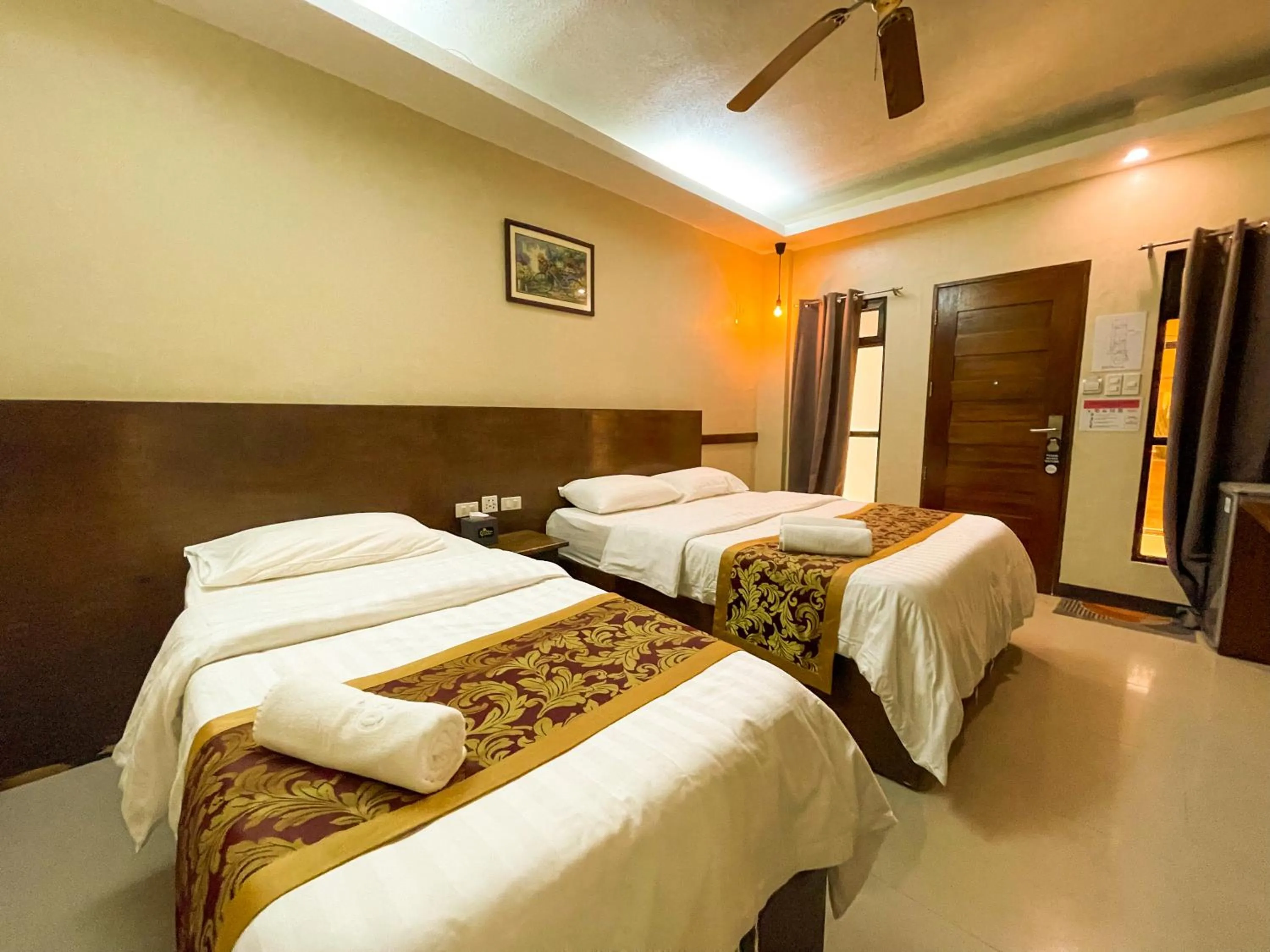 Photo of the whole room, Bed in Casa Marco Suites Puerto Galera powered by Cocotel