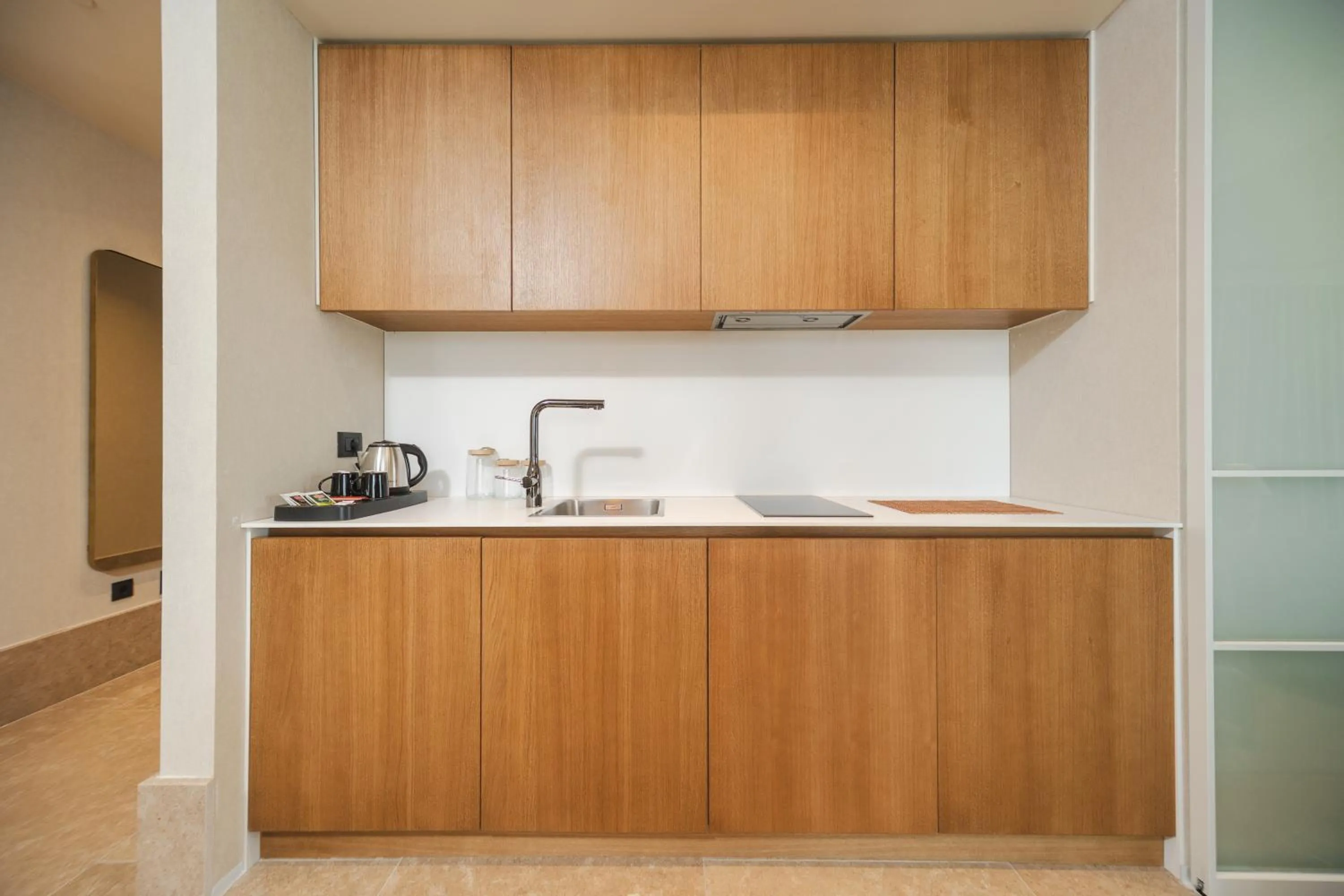 Kitchen or kitchenette in Infinity Hotel & More