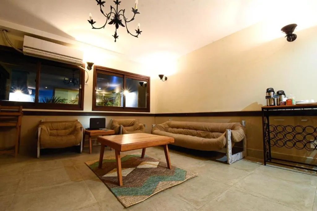 Living room in Pousada Paris Hostelli