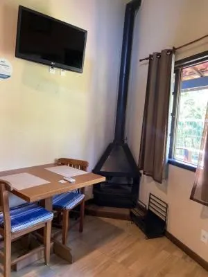 fireplace in Pousada Paris Hostelli