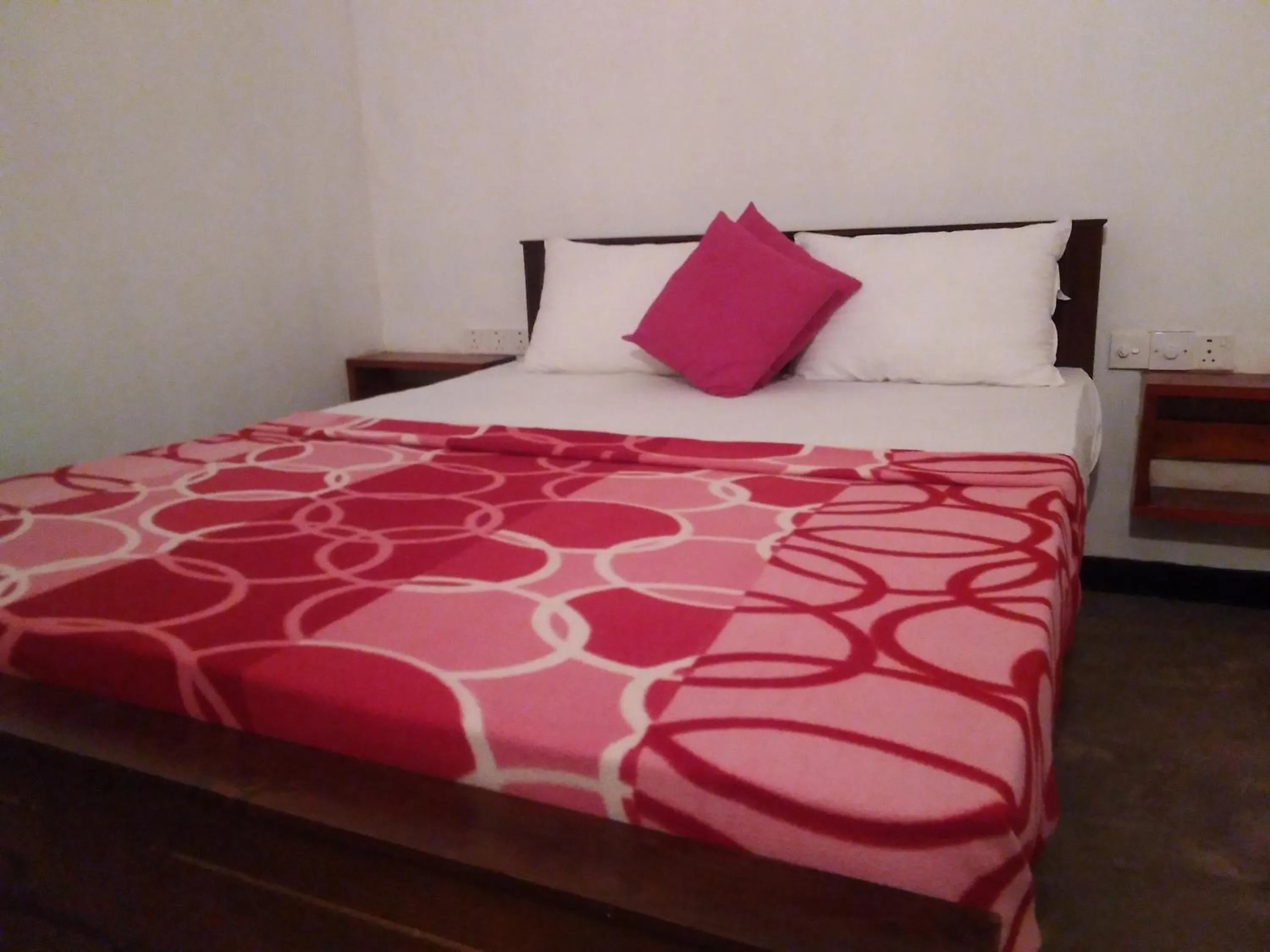 Bed in THE NEVANS SIGIRIYA