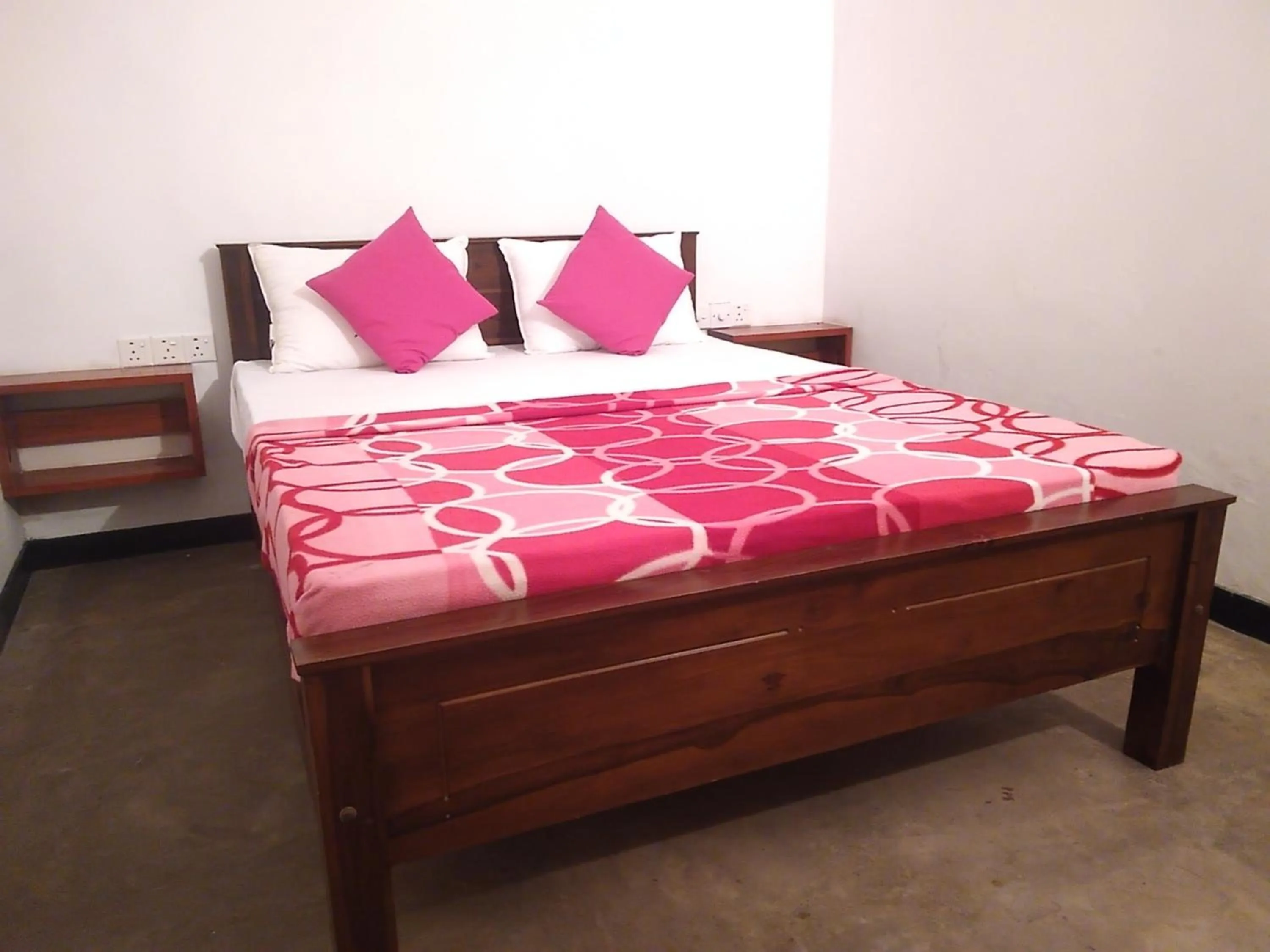 Bed in THE NEVANS SIGIRIYA