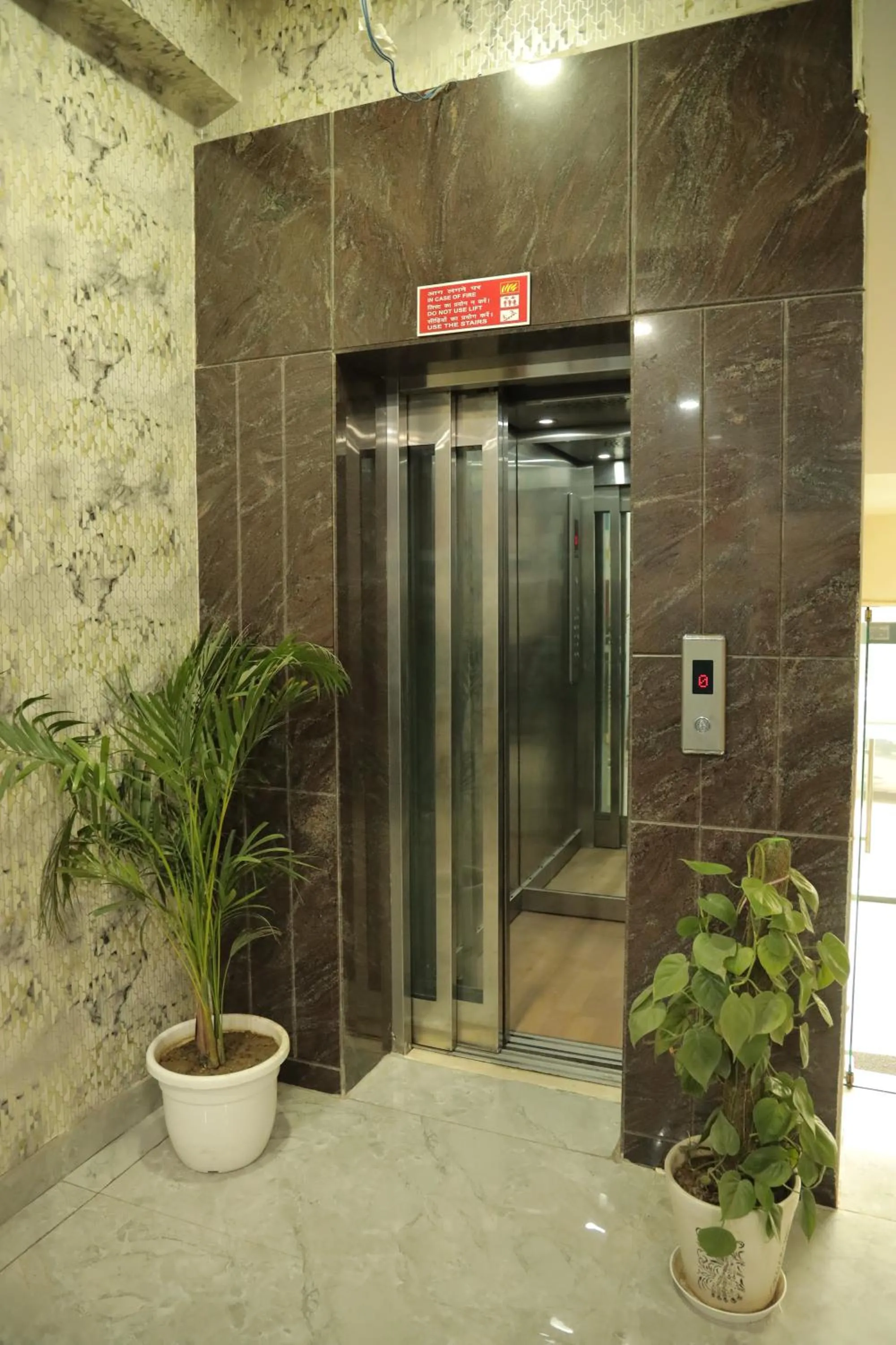 elevator in Hotel Nirvana Suites