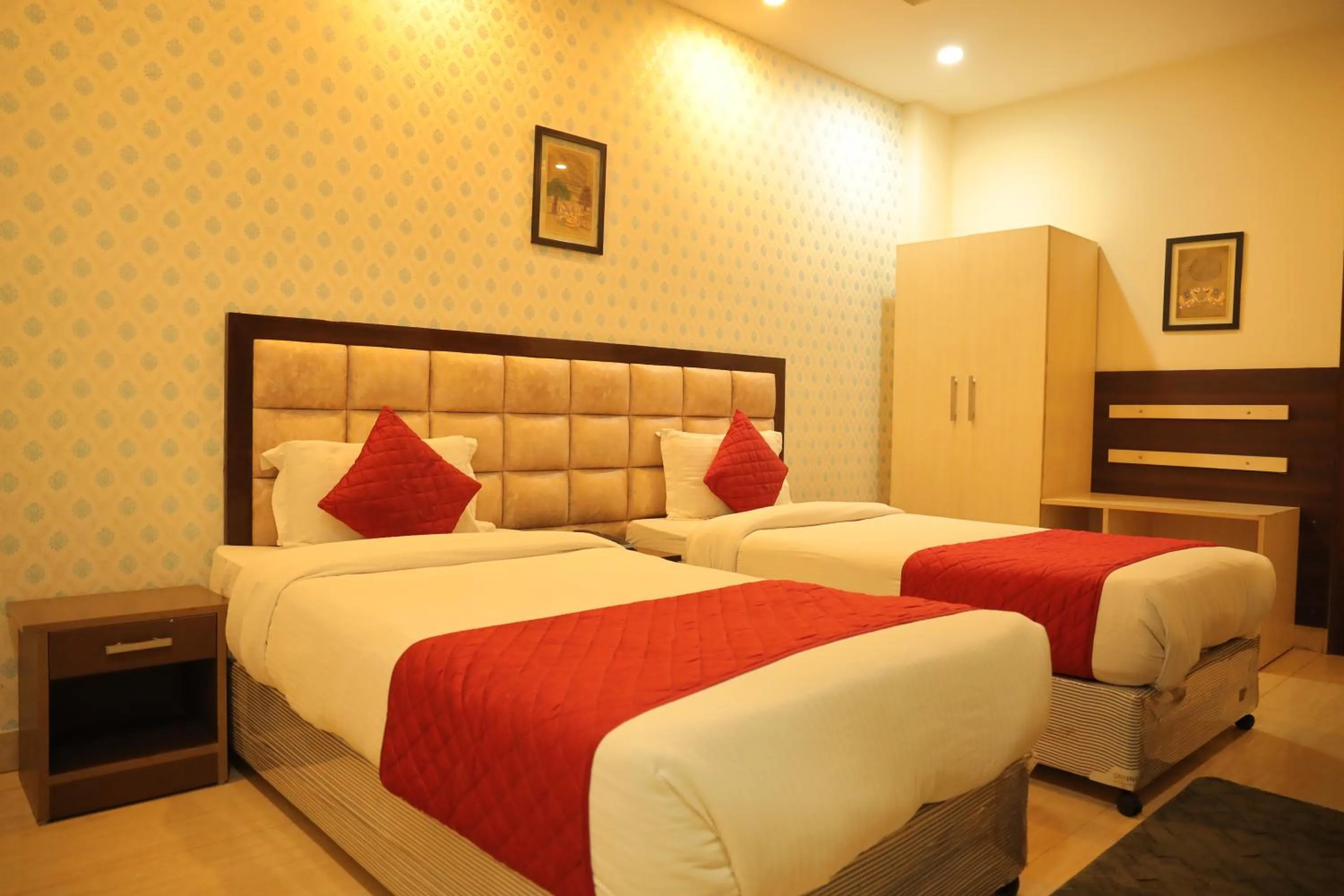 Bedroom, Bed in Hotel Nirvana Suites