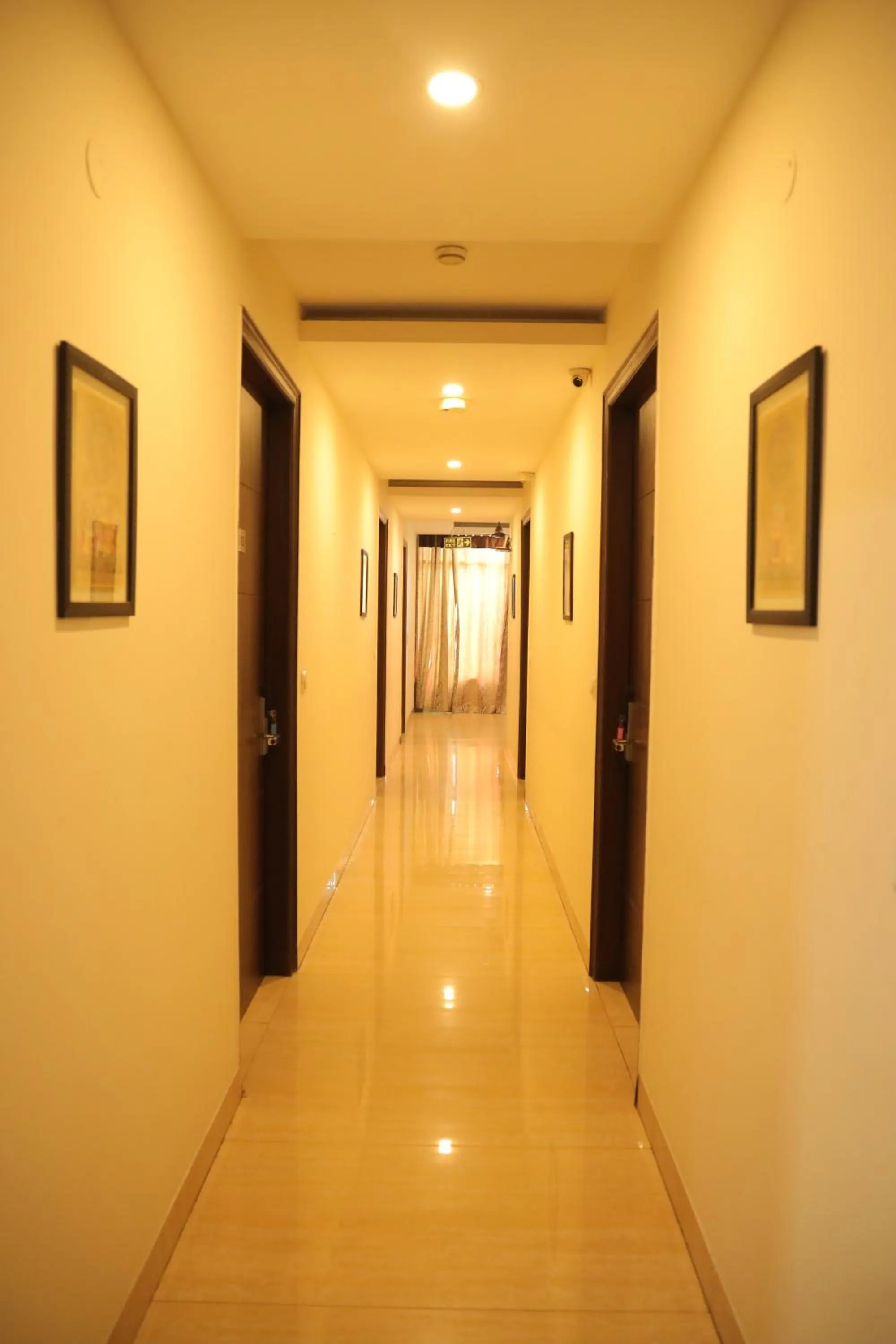 Bed in Hotel Nirvana Suites