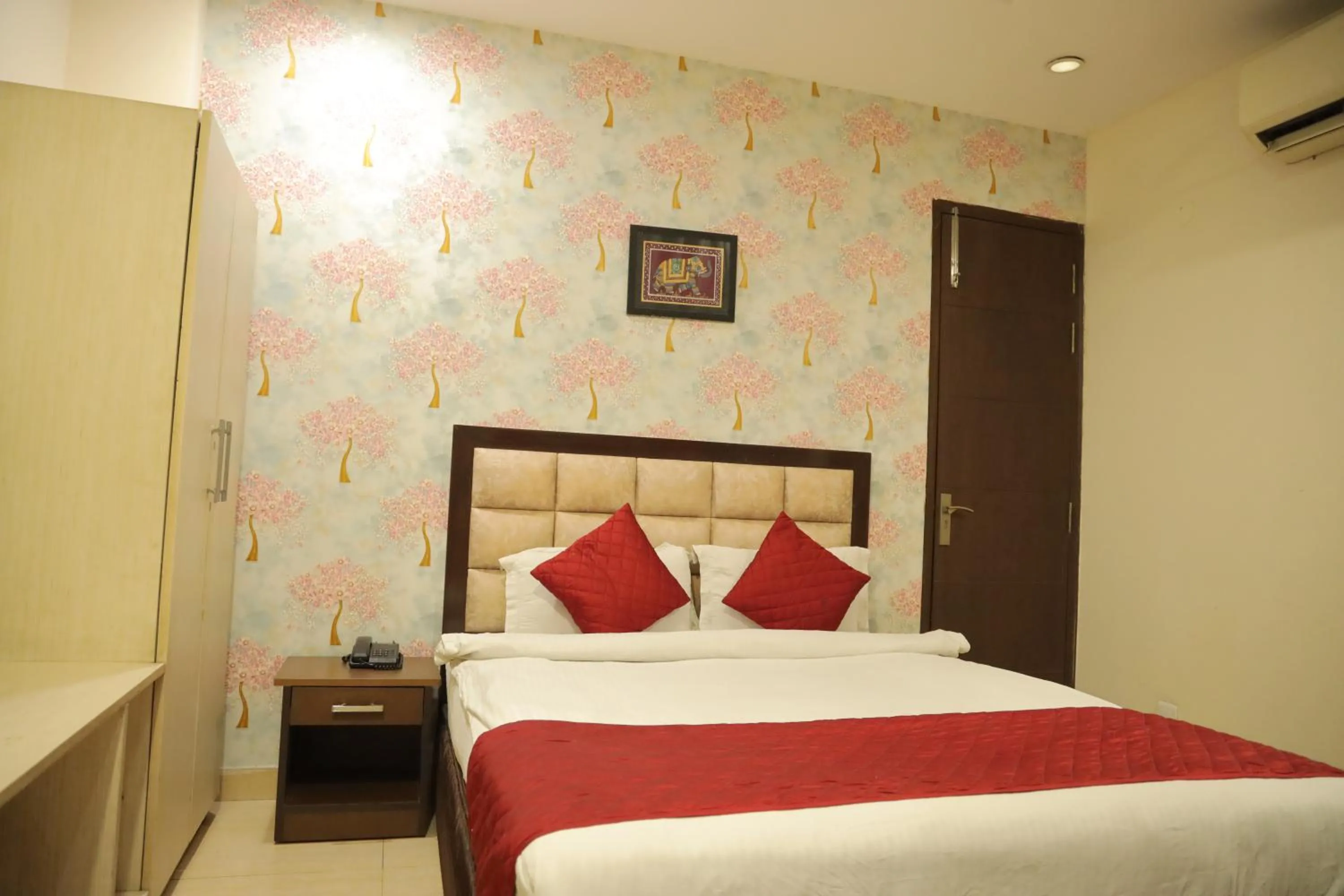 Bedroom, Bed in Hotel Nirvana Suites