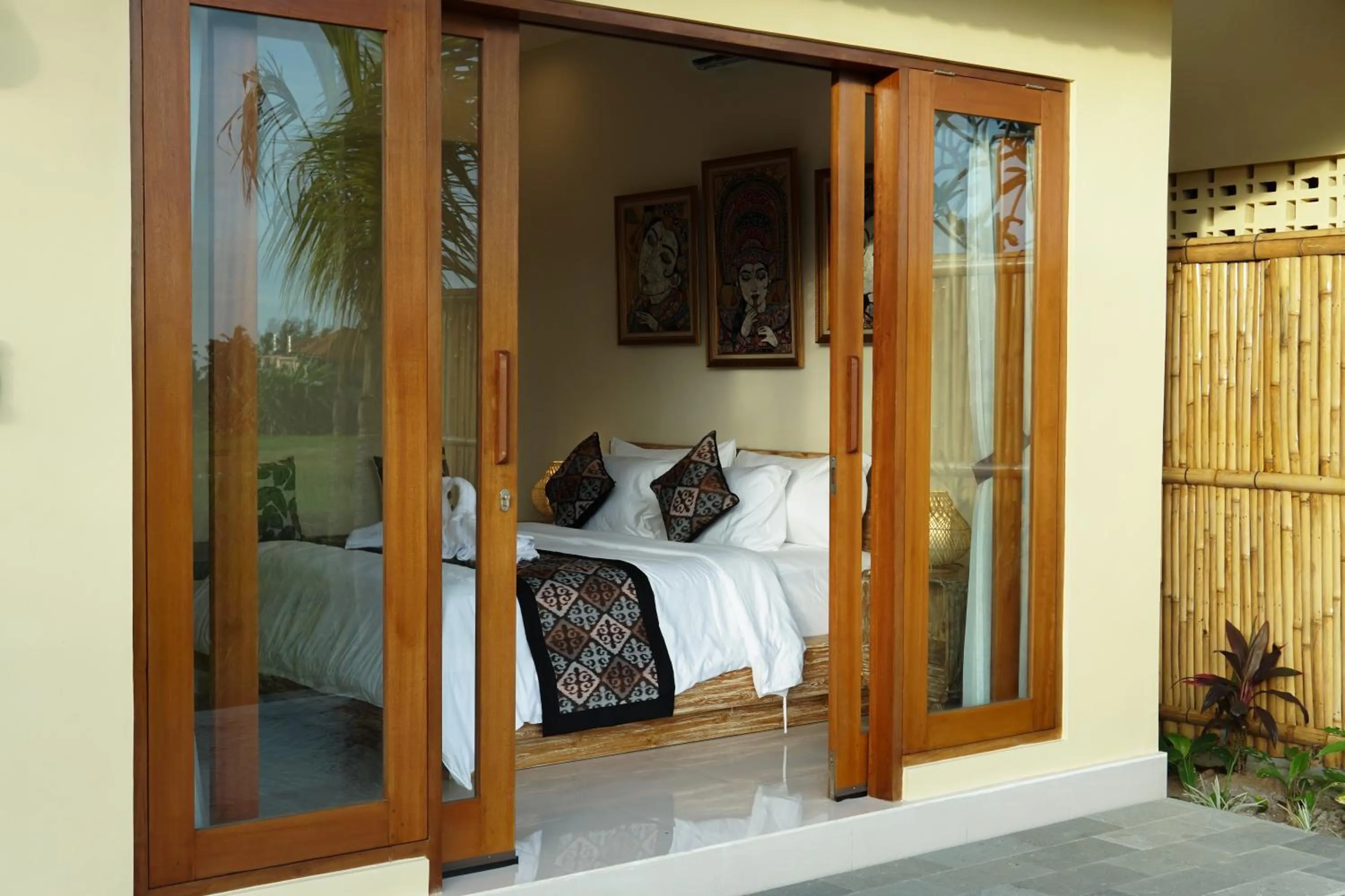 Patio, Bed in Uma Rimbun Villa by Dhananjaya Hospitality