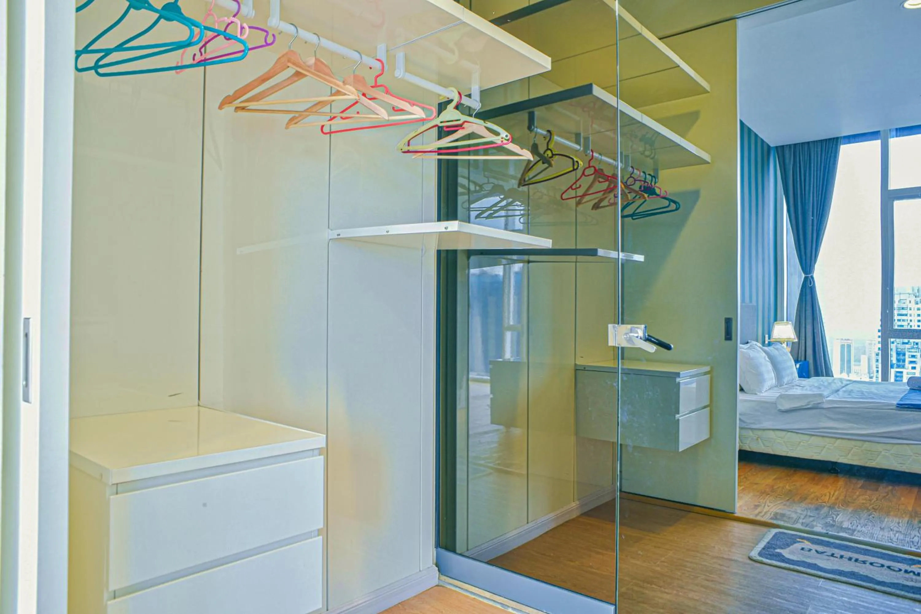 wardrobe, Bed in SKYWARD SUITES at Platinum KLCC