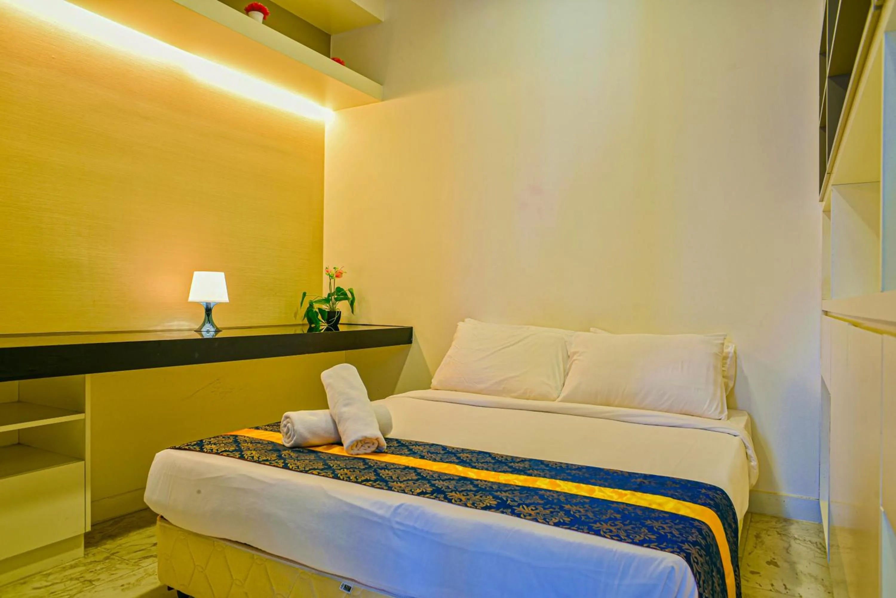 Bed in SKYWARD SUITES at Platinum KLCC