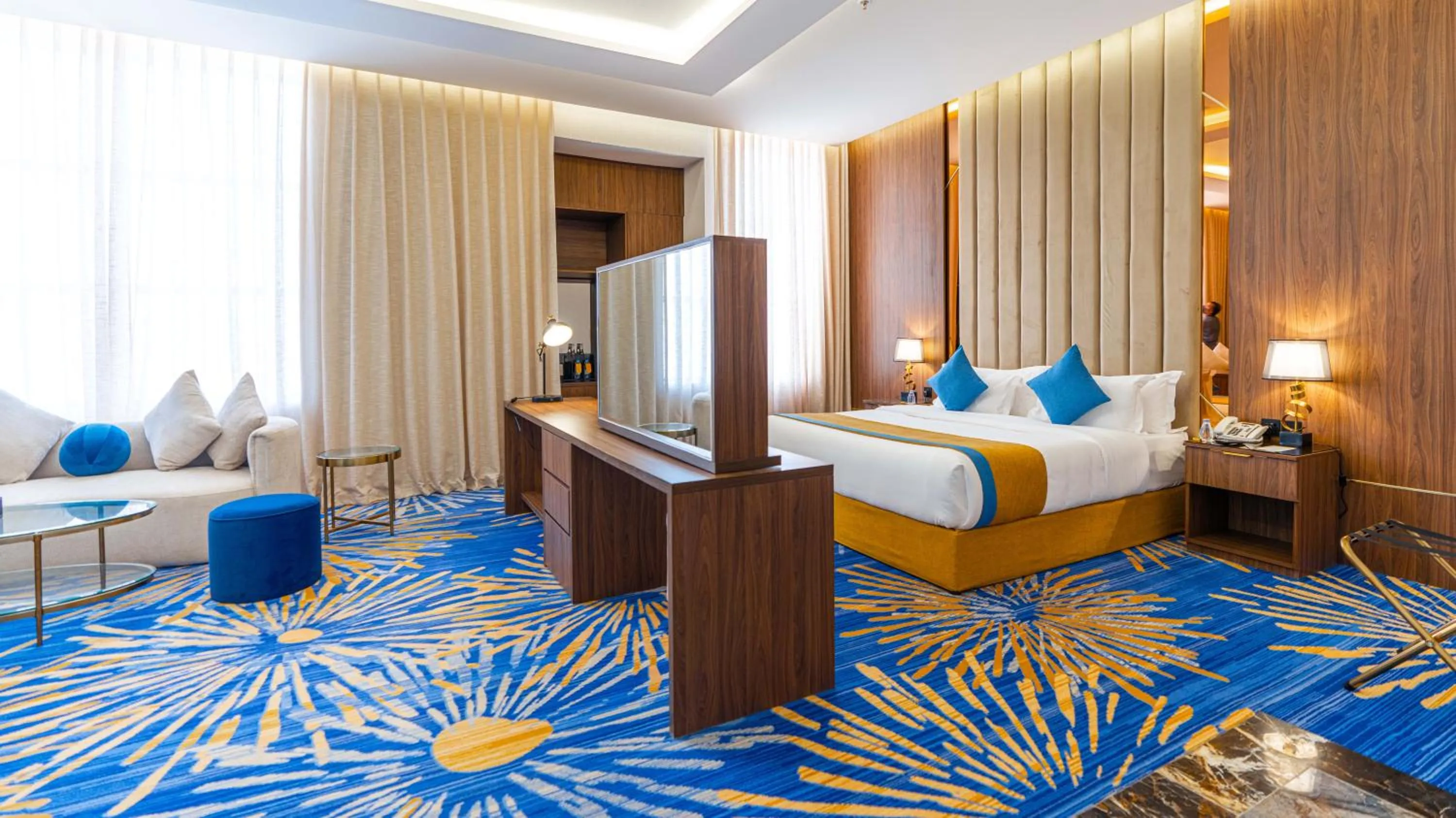 Living room, Bed in Novo Hotel