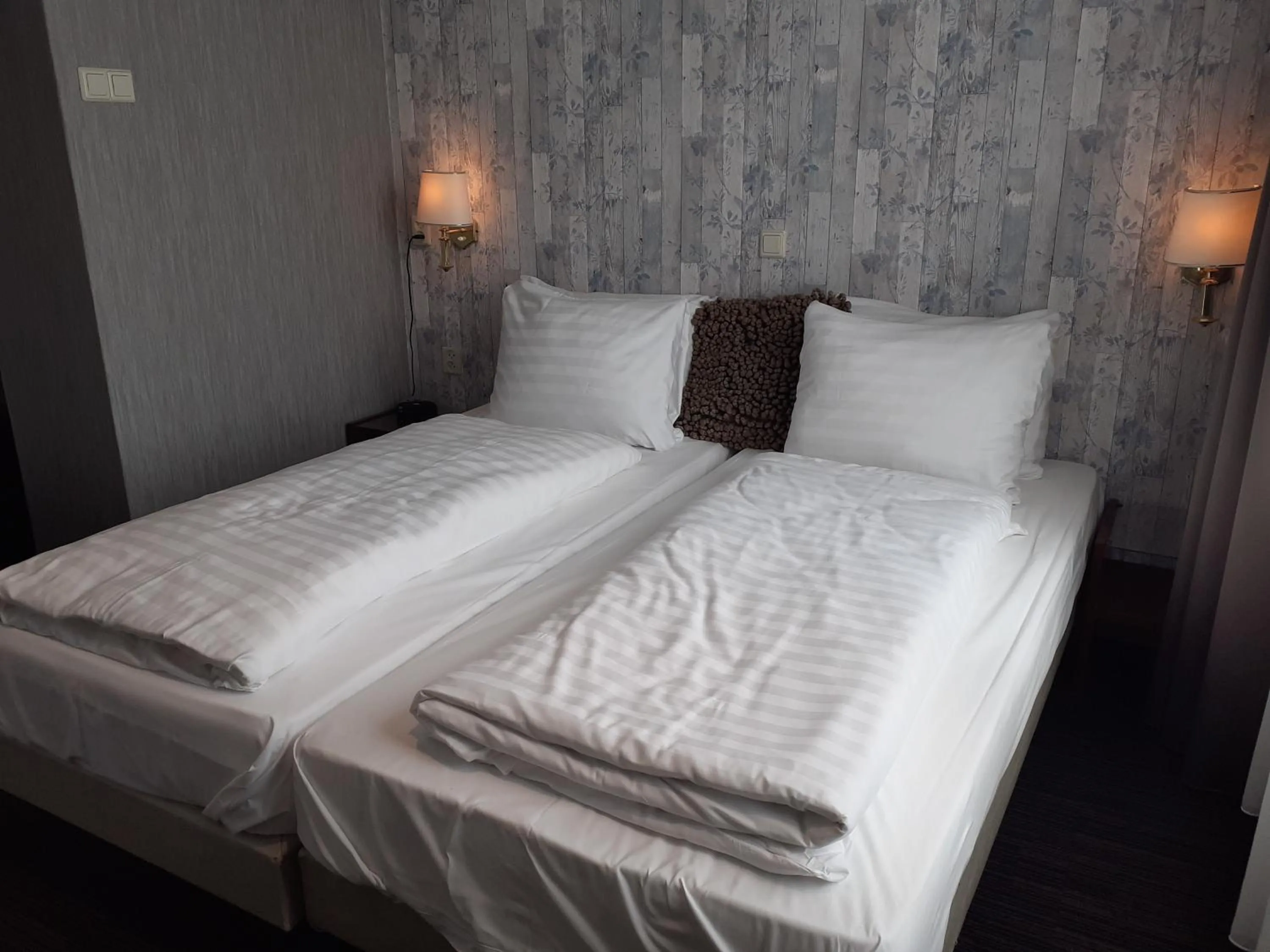 Bed in Grand Hotel Monopole