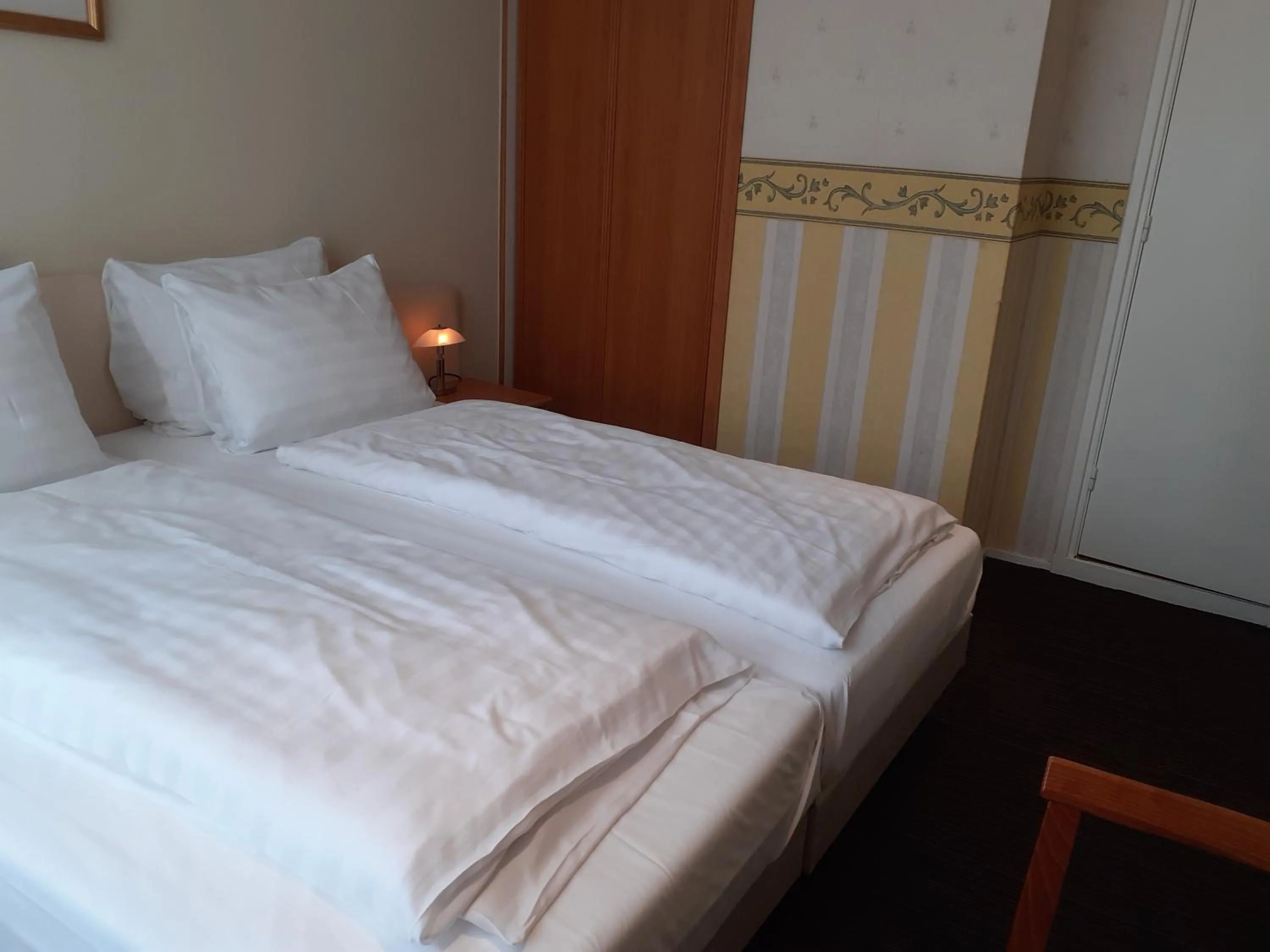 Bed in Grand Hotel Monopole