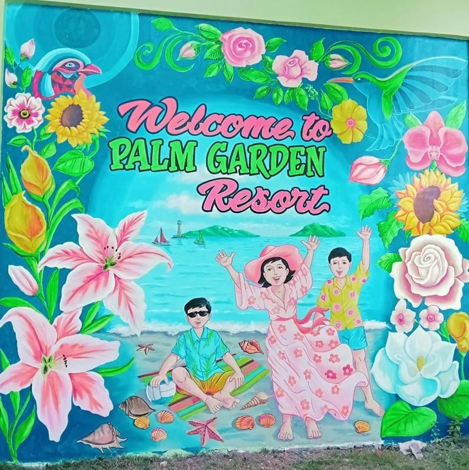 Property logo or sign in Palm Garden Resort