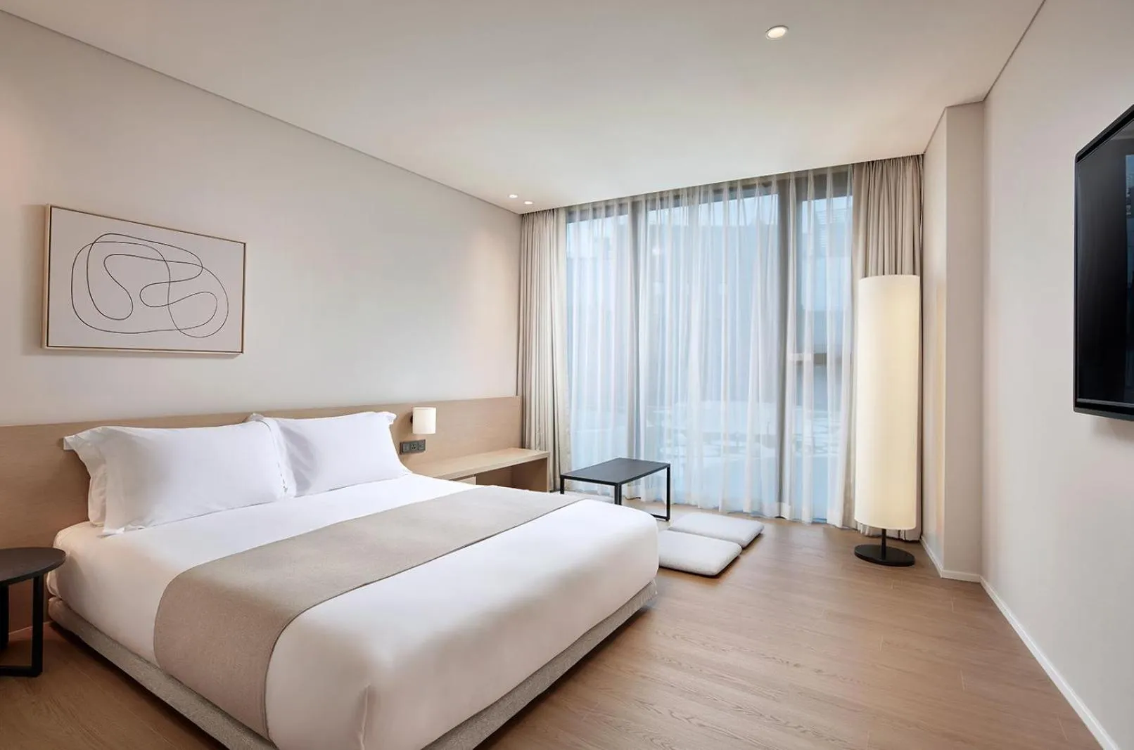 Bed in Shilla Stay Plus Iho Tewoo Ocean Front