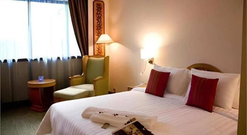 Bed in The CentrePoint Hotel