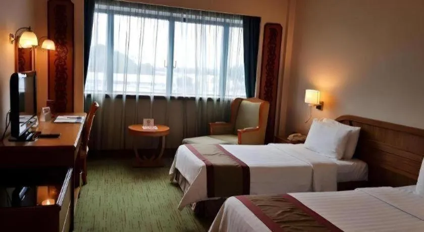 Bed in The CentrePoint Hotel