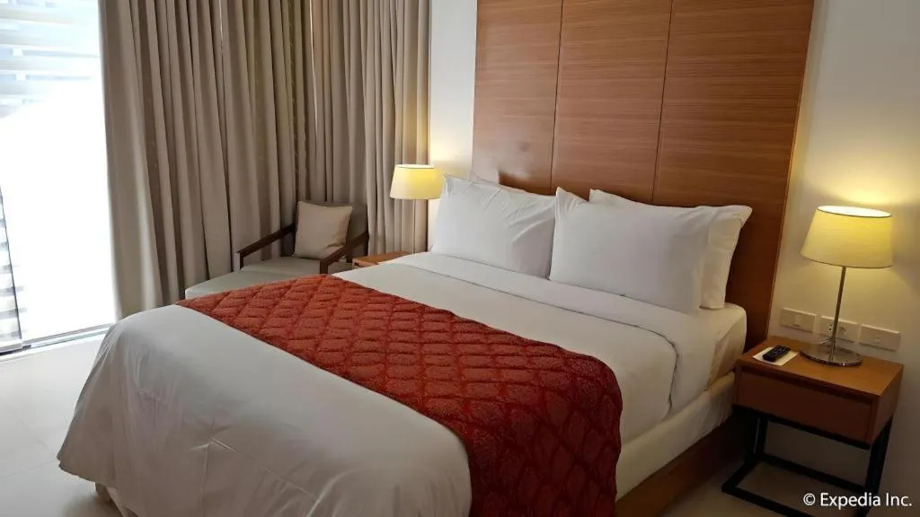 Bed in Pontefino Hotel and Residences
