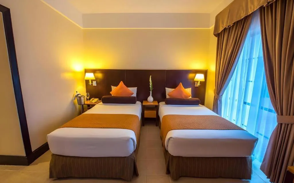 Bed in Pontefino Hotel and Residences