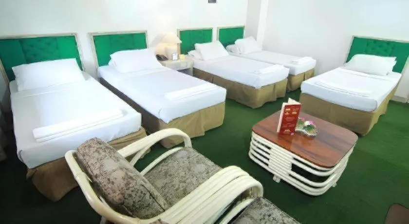 Bed in Hotel Supreme