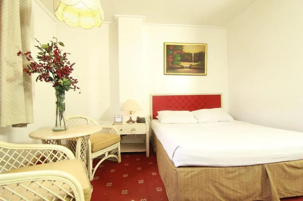 Bed in Hotel Supreme