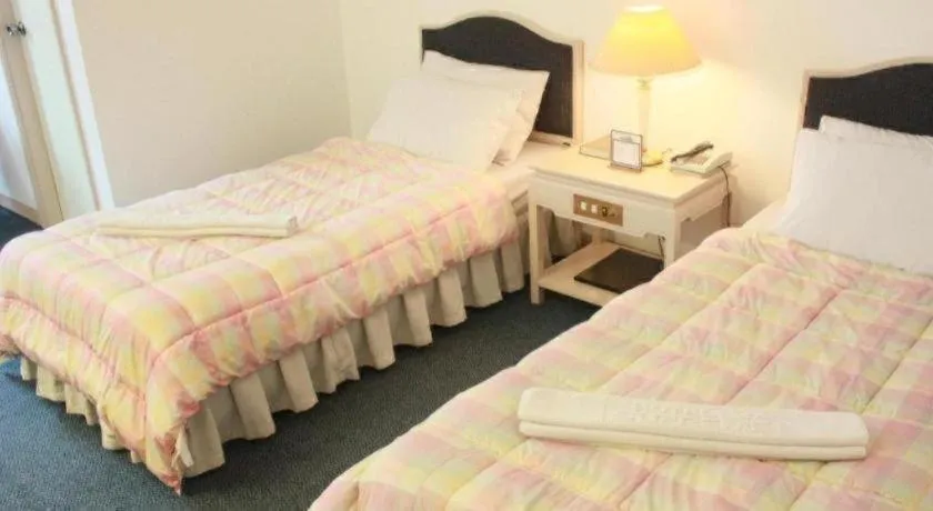 Bed in Hotel Supreme