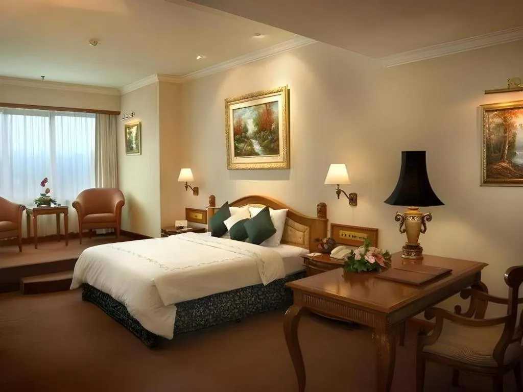 Bed in Grand Aquila Hotel