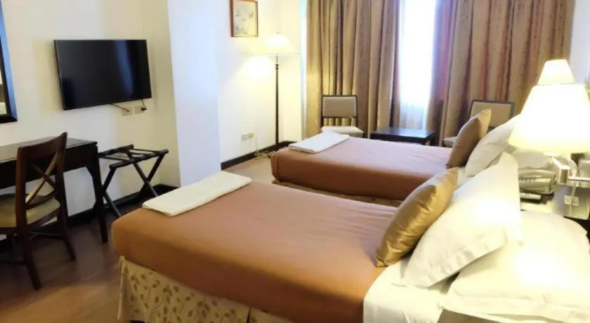 Bed in Hotel Supreme Convention Plaza