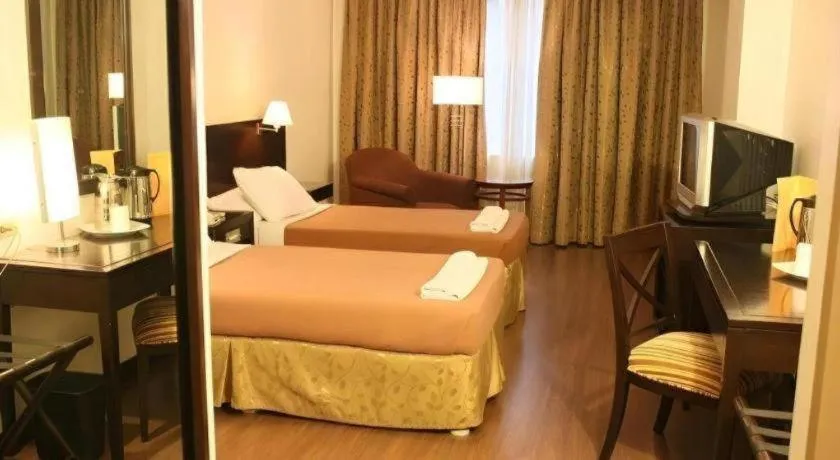 Bed in Hotel Supreme Convention Plaza