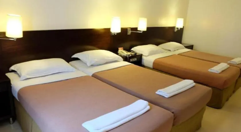 Bed in Hotel Supreme Convention Plaza