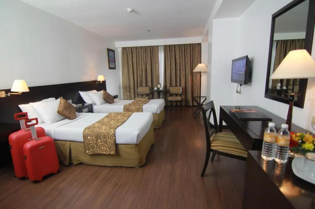 Bed in Hotel Supreme Convention Plaza