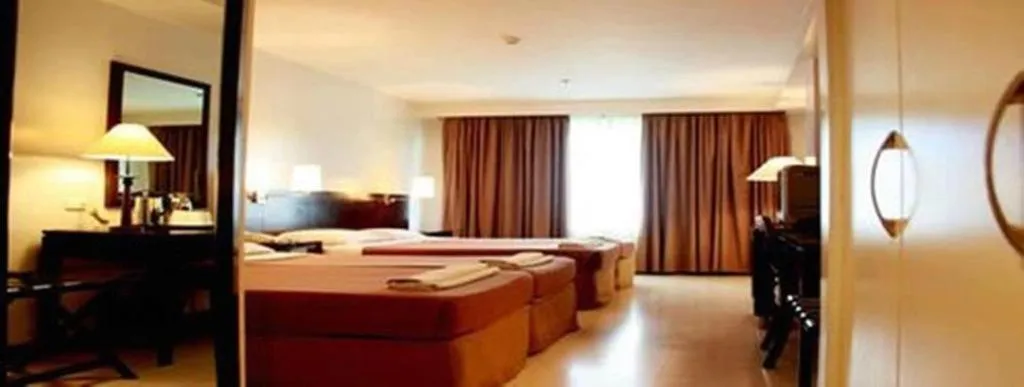 Bed in Hotel Supreme Convention Plaza