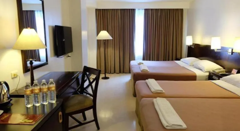 Bed in Hotel Supreme Convention Plaza