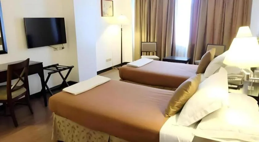 Bed in Hotel Supreme Convention Plaza
