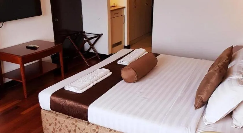 Bed in Hotel Supreme Convention Plaza