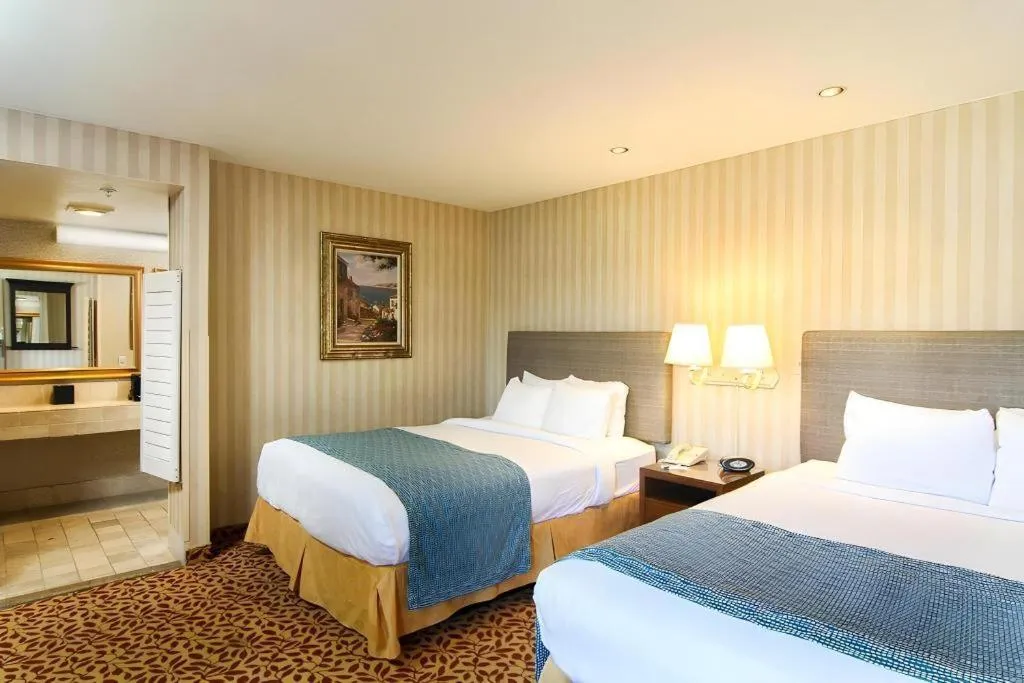 Bed in Laguna Brisas - A Beach Hotel