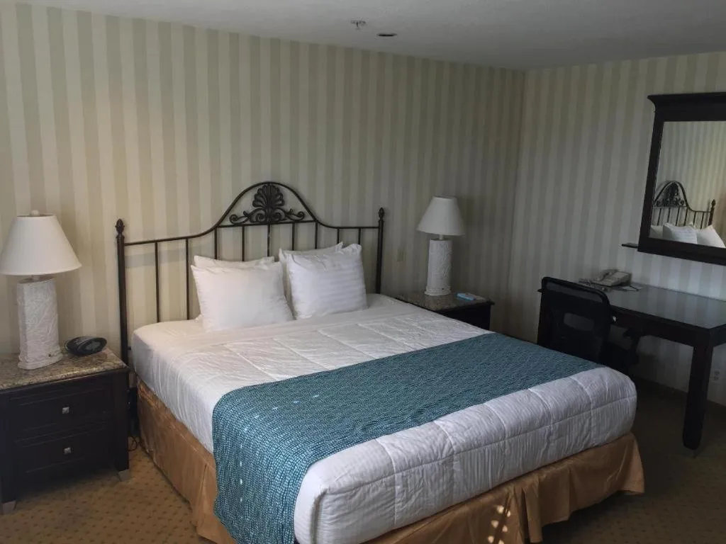 Bed in Laguna Brisas - A Beach Hotel