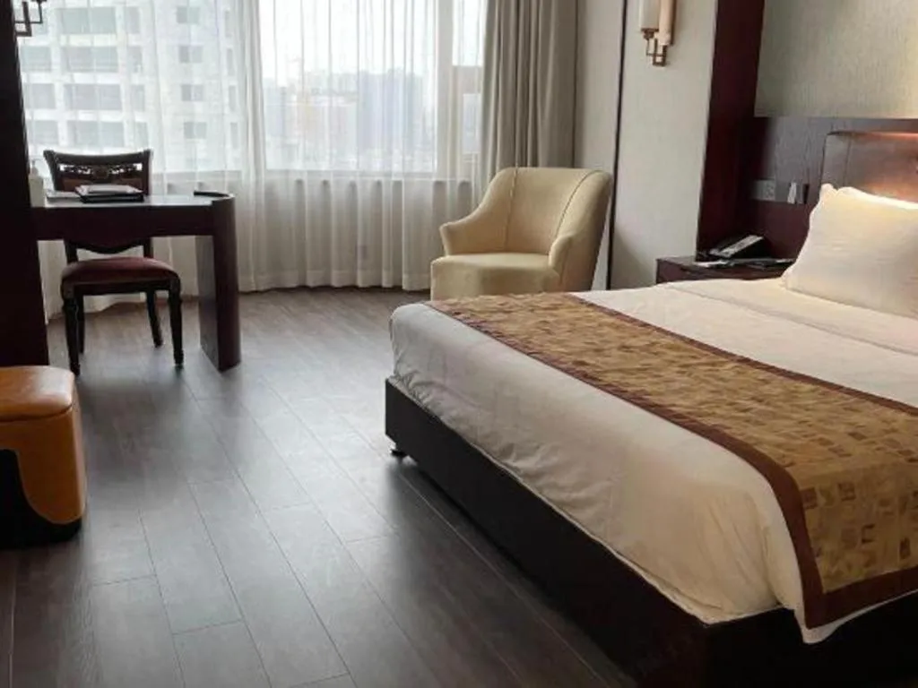 Bed in Xian Empress Hotel