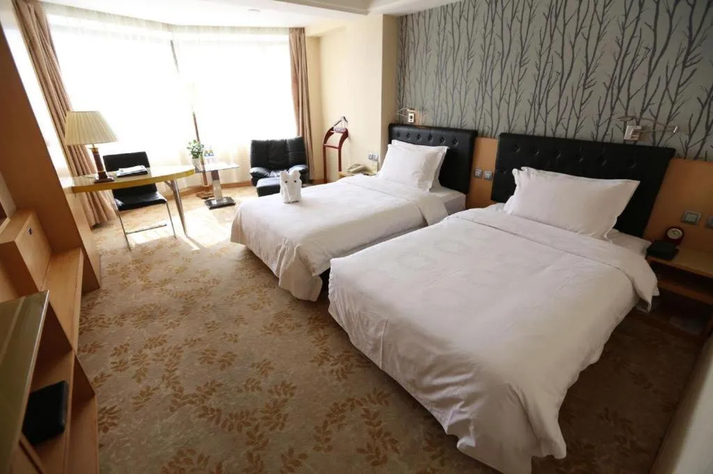 Bed in Xian Empress Hotel