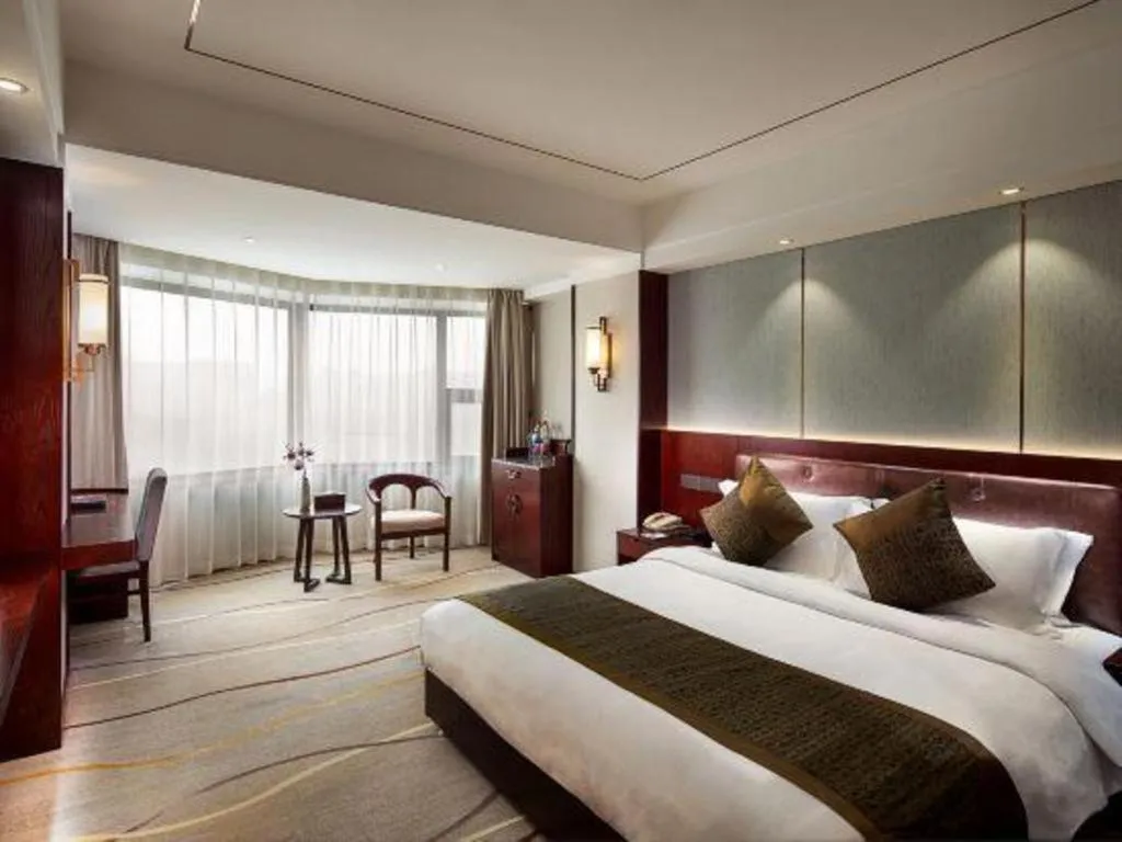 Bed in Xian Empress Hotel